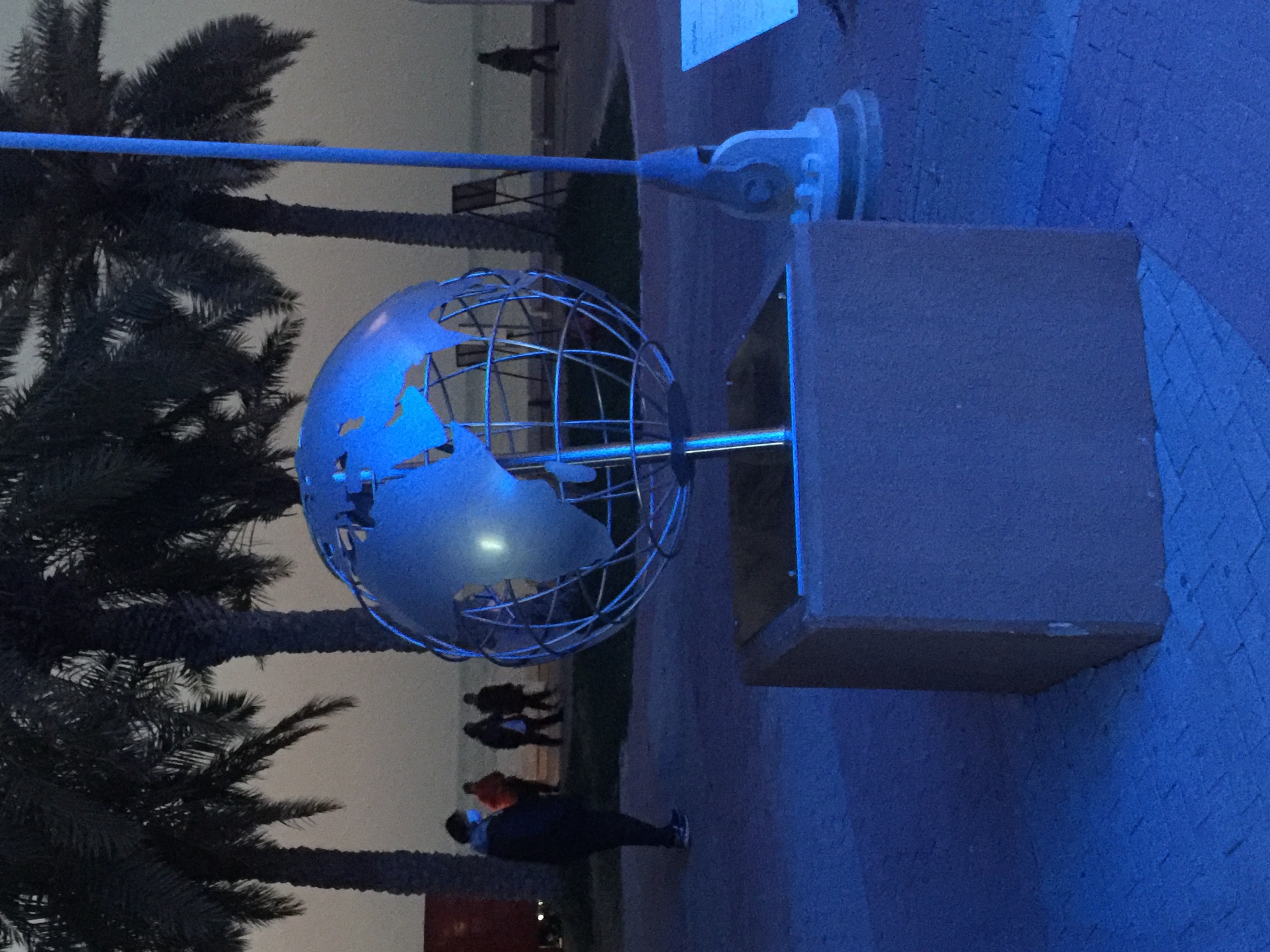 Illuminated globe installation at The Scientific Center waterfront